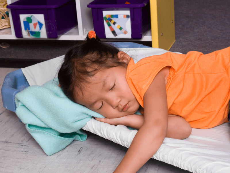 baby in crib, sleeping and napping at daycare